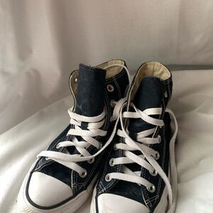 Black high top converse sneakers